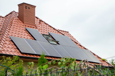 House roof with photovoltaic modules.