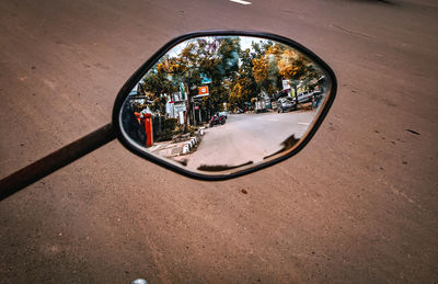 Close-up of car on road