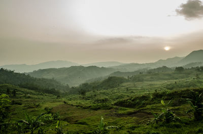 Scenic view of mountains against sky during sunset