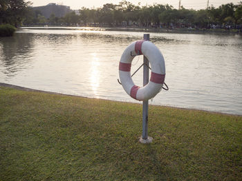 Full length of man standing on lakeshore