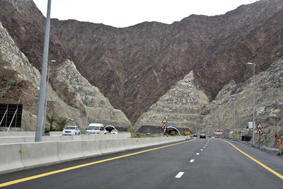 Road leading towards mountains