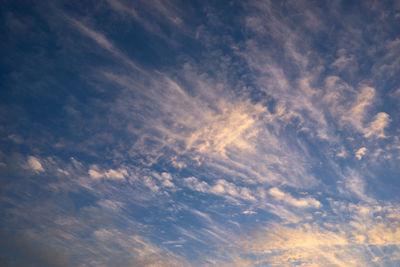 Low angle view of clouds in sky during sunset