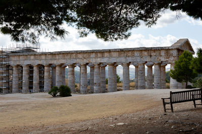 View of historical building against cloudy sky