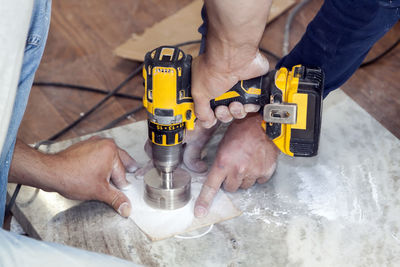 High angle view of man working on table