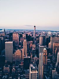 High angle view of city buildings against sky