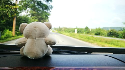 Road seen through car windshield