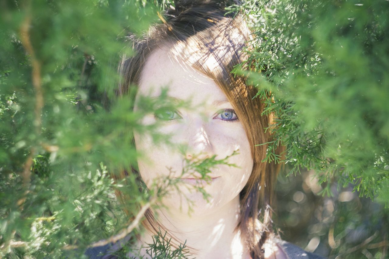 young adult, young women, headshot, lifestyles, person, leisure activity, long hair, focus on foreground, close-up, portrait, nature, water, looking at camera, day, outdoors, front view, plant