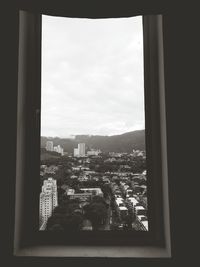 Cityscape seen through window