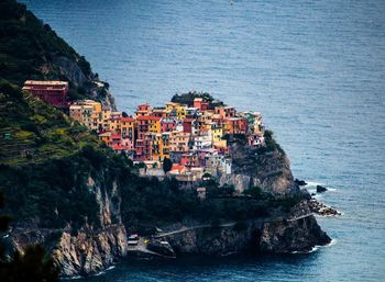 High angle view of houses at liguria by sea