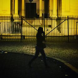 Woman standing at sunset