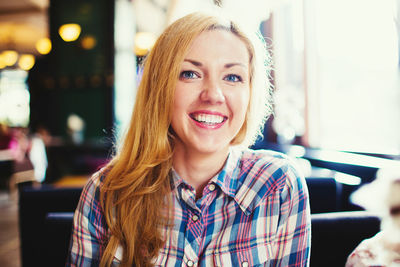 Portrait of smiling young woman