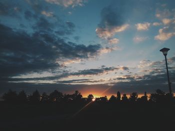 Scenic view of cloudy sky at sunset