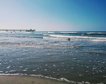 Scenic view of sea against clear sky