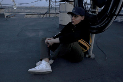 Side view of young man looking away