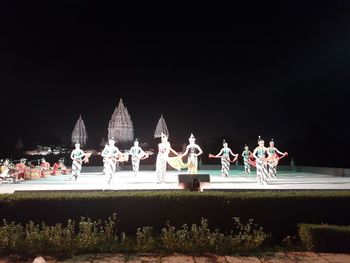 Sculpture of illuminated temple against clear sky at night