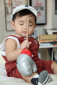 Cute baby girl playing at home