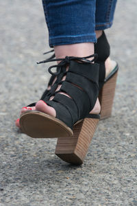 Low section of woman standing on floor