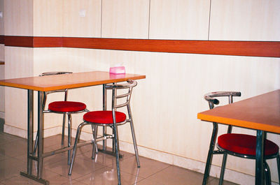 Empty chairs and table at home