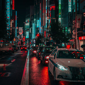 Traffic on city street at night