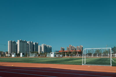 View of buildings against blue sky