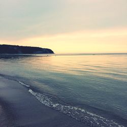 Scenic view of sea at sunset