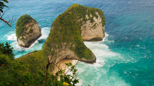 High angle view of rock formation in sea