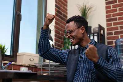 Cheerful businessman at office