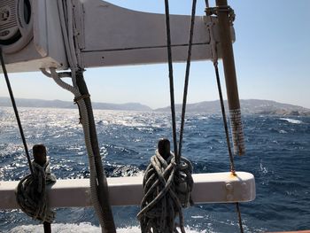 Sailboat on sea against sky