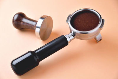 High angle view of coffee cup on table