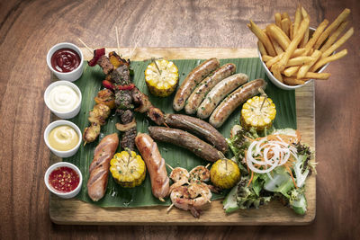 High angle view of fruits in plate on table