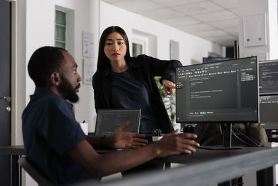 Business colleagues working at office