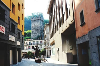 Buildings in city against sky