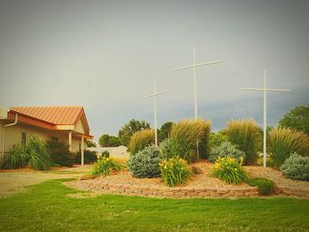 Built structure on landscape against sky