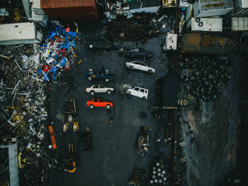 High angle view of abandoned cars in city