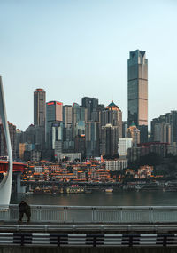 Skyscrapers in city against clear sky