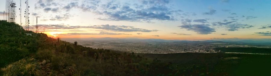 Scenic view of landscape against sky during sunset