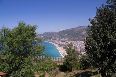 Scenic view of mountain against clear blue sky