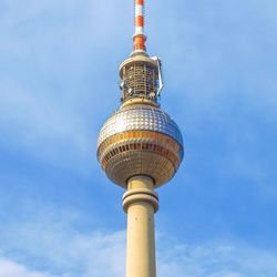 Low angle view of fernsehturm tower against sky