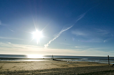 Scenic view of sea against sky at sunset