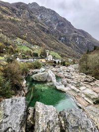 Scenic view of rocks in mountains against sky