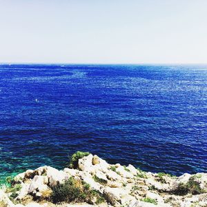 Scenic view of sea against clear sky