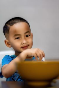 Portrait of cute boy smiling