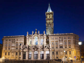 Low angle view of basilica di santa maria maggiore against blue sky