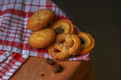 High angle view of cookies on cutting board