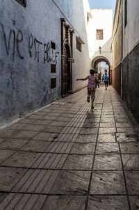 People walking on street in city