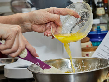 Cook puts the egg yolks in the pie bowl