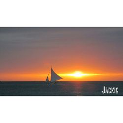 Scenic view of sea at sunset