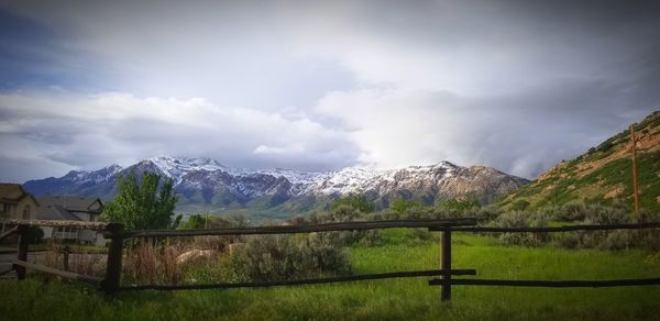 Scenic view of snowcapped mountains against sky