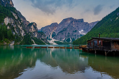 Scenic view of lake and mountains against sky