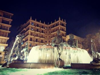 Illuminated buildings at night